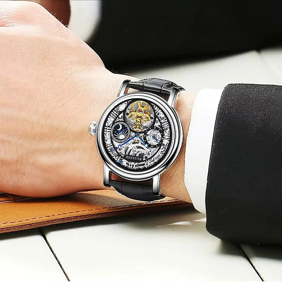 Patek Philippe Men’s Black Sunray Dial Silver-Tone Watch